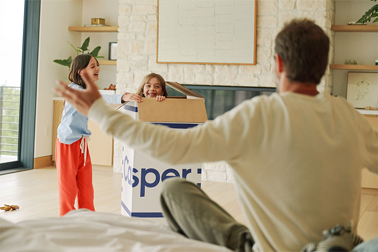Casper being unboxed with dad and kids playing